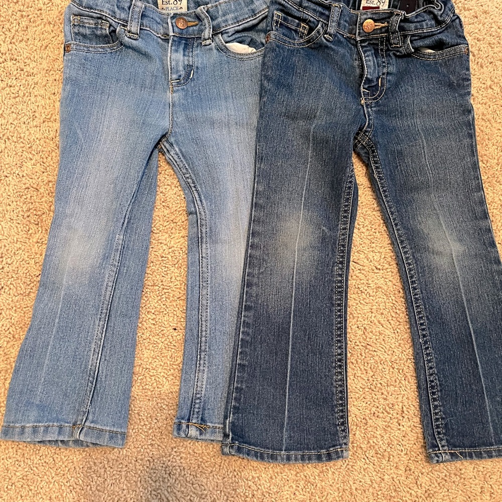 Pair of girls boot cut jeans